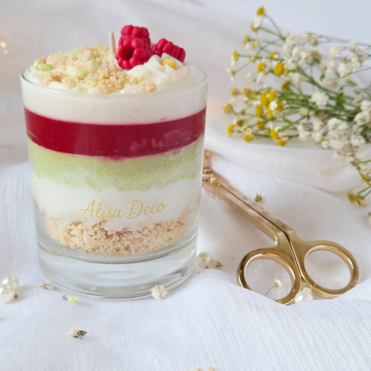 Detail der Wachsddekoration mit Himbeer- und Keksoptik